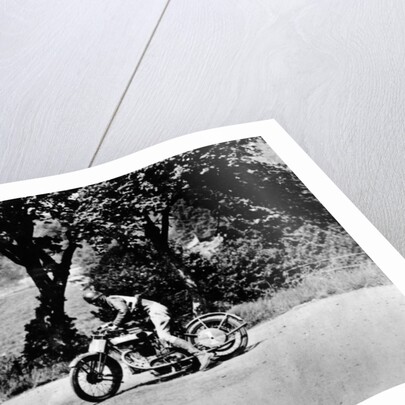 A man on a Norton bike taking part in the Belgian Grand Prix by Anonymous