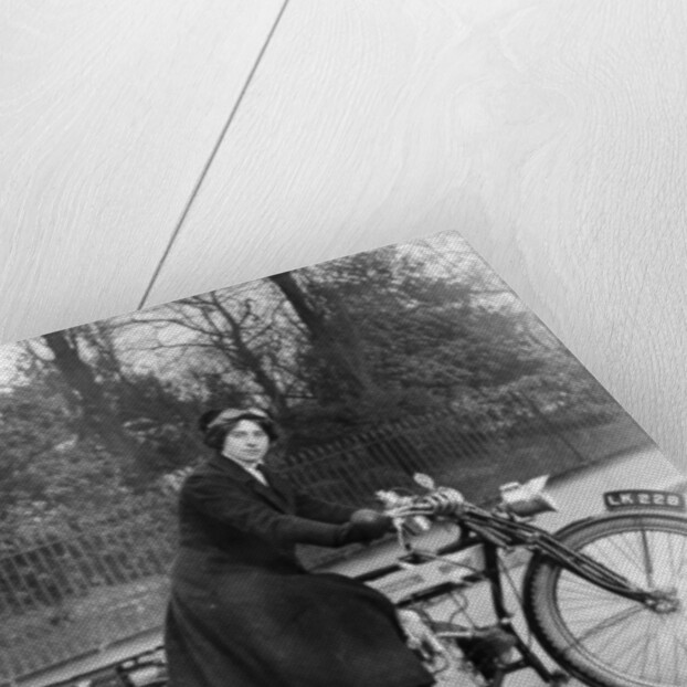 A woman on a Douglas motorbike by Anonymous