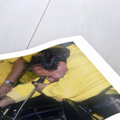 Mechanic at work in the Ferrari pits, 1988 by Unknown
