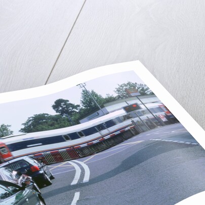 Traffic queue at level crossing in Brockenhurst, Hampshire by Unknown