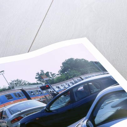 Traffic queue at level crossing in Brockenhurst, Hampshire by Unknown