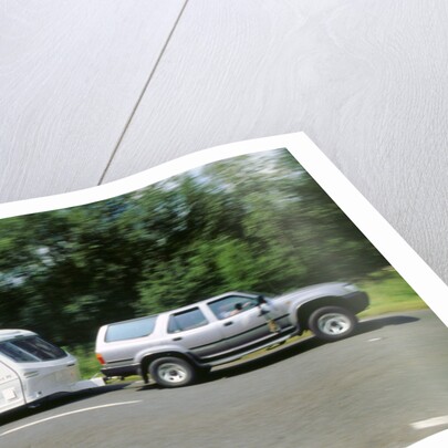 1995 Toyota Landcruiser towing large caravan at speed by Unknown