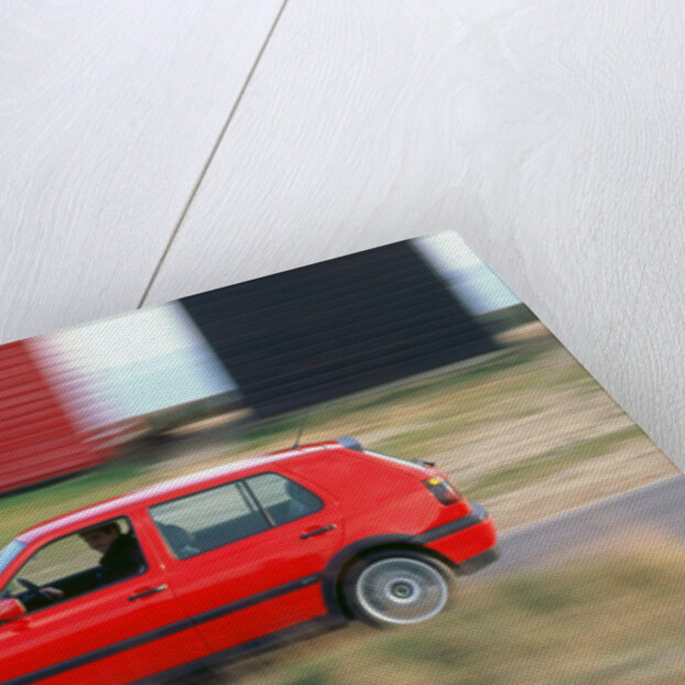 Man driving 1996 Vokswagen Golf Gti by Unknown