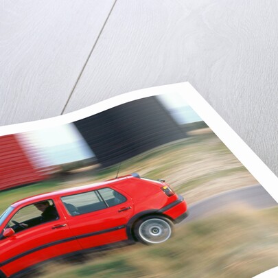 Man driving 1996 Vokswagen Golf Gti by Unknown