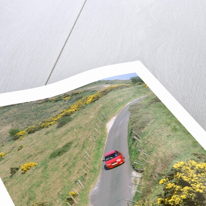 1996 Suzuki Baleno GS Sport on winding country lane,Dorset by Unknown