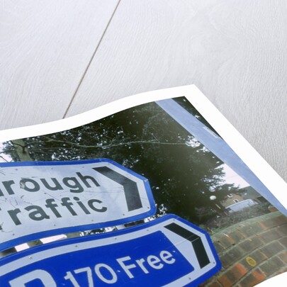 Road sign with graffiti by Unknown