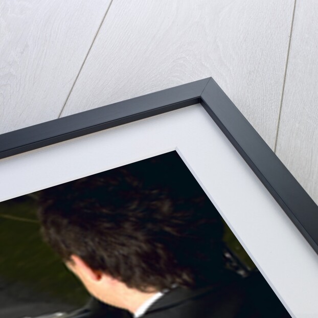 Chauffeur driving 1970 Daimler vanden plas DS 420 limousine by Unknown