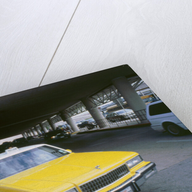 Yellow taxi cab at airport by Unknown