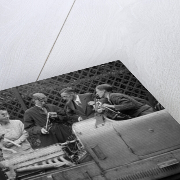 Denis Evans inspecting the plugs of his Bugatti Type 43 2262cc by Bill Brunell