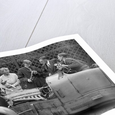 Denis Evans inspecting the plugs of his Bugatti Type 43 2262cc by Bill Brunell