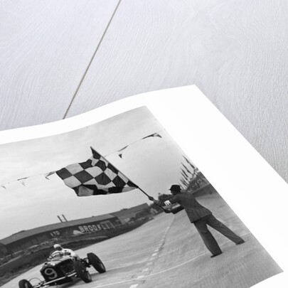 Alfa Romeo taking the chequred flag in a race at Brooklands by Bill Brunell