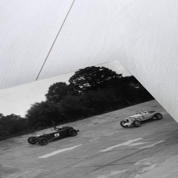 Invicta and Vauxhall 30/98 racing on the banking at an Inter-Club Meeting, Brooklands, 20 June 1931 by Bill Brunell
