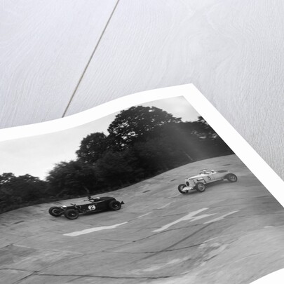 Invicta and Vauxhall 30/98 racing on the banking at an Inter-Club Meeting, Brooklands, 20 June 1931 by Bill Brunell