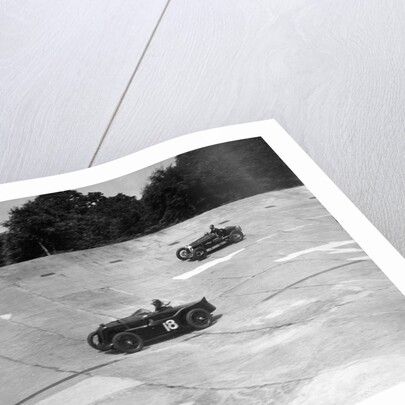 MG C type and Amilcar C6 racing on the banking at Brooklands by Bill Brunell