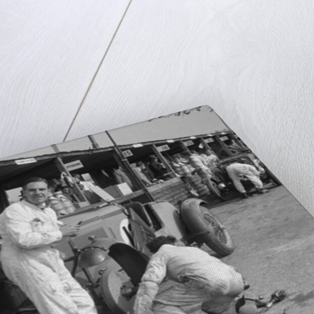 Mechanic working on a Talbot 105 at the JCC Double Twelve race, Brooklands, 8/9 May 1931 by Bill Brunell