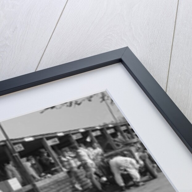 Mechanic working on a Talbot 105 at the JCC Double Twelve race, Brooklands, 8/9 May 1931 by Bill Brunell