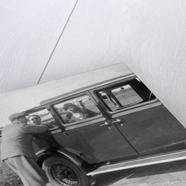 Hugh McConnell, Sammy Davis and Mrs Davis with an Austin 20/6 landaulette at Brooklands, 1931 by Bill Brunell