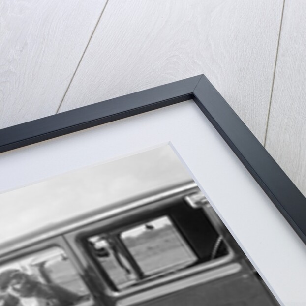 Hugh McConnell, Sammy Davis and Mrs Davis with an Austin 20/6 landaulette at Brooklands, 1931 by Bill Brunell