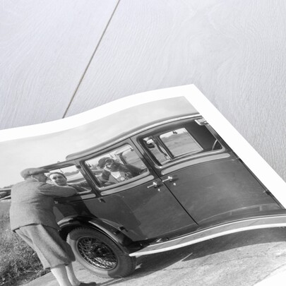 Hugh McConnell, Sammy Davis and Mrs Davis with an Austin 20/6 landaulette at Brooklands, 1931 by Bill Brunell