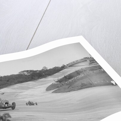 Sir Henry Birkin's Bentley leading Earl Howe's Bugatti Type 54, BARC meeting, Brooklands, May 1932 by Bill Brunell