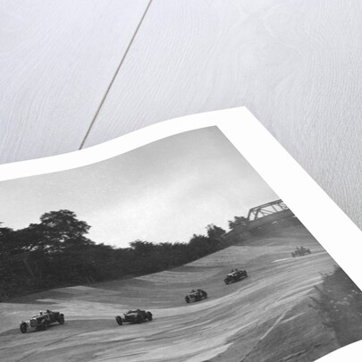 Cars racing on the banking at a JCC Members Day, Brooklands by Bill Brunell