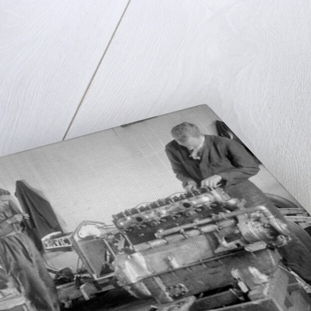 Mechanics working on Raymond Mays' 4500 cc Invicta car by Bill Brunell