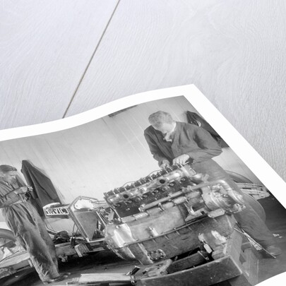 Mechanics working on Raymond Mays' 4500 cc Invicta car by Bill Brunell