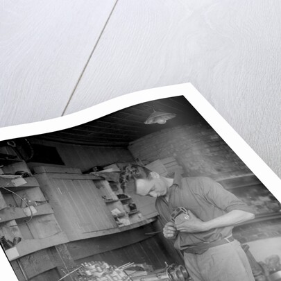 Mechanic working on Raymond Mays' 2996 cc Vauxhall-Villiers by Bill Brunell