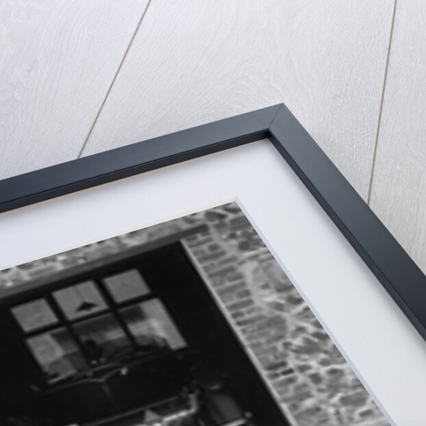 Geoffrey Baker standing in front of a Minerva 5954 cc car by Bill Brunell