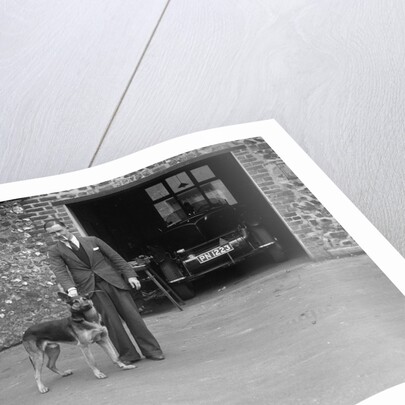 Geoffrey Baker standing in front of a Minerva 5954 cc car by Bill Brunell