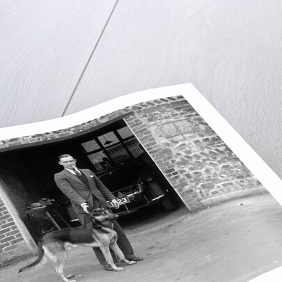 Geoffrey Baker and his alsatian by Bill Brunell