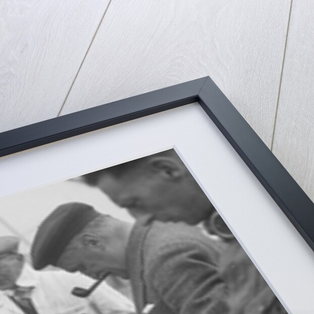 People examining Leon Cushman's Austin 7 racer at Brooklands for a speed record attempt, 1931 by Bill Brunell