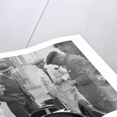 People examining Leon Cushman's Austin 7 racer at Brooklands for a speed record attempt, 1931 by Bill Brunell
