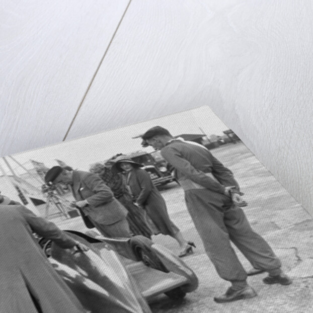 People examining Leon Cushman's Austin 7 racer at Brooklands for a speed record attempt, 1931 by Bill Brunell