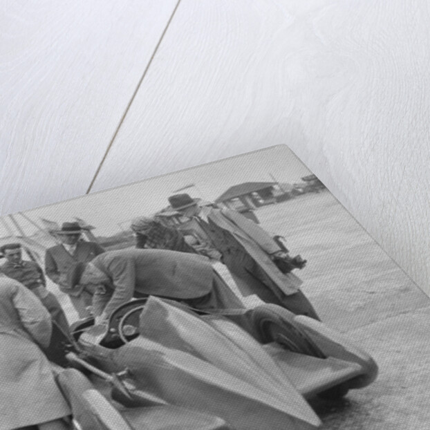 People examining Leon Cushman's Austin 7 racer at Brooklands for a speed record attempt, 1931 by Bill Brunell