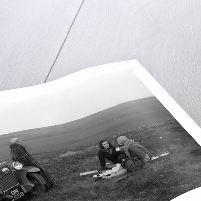 Three women having a picnic during a road test of a Triumph Scorpion, 1931 by Bill Brunell