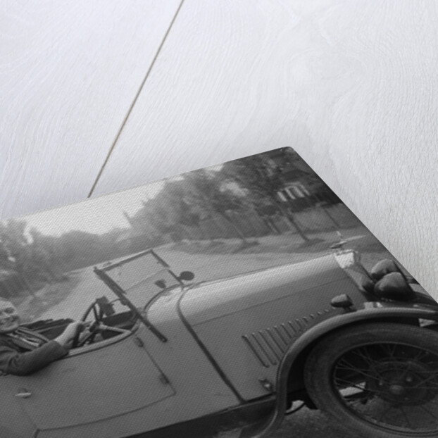 FA Thatcher behind the wheel of a 1929 Triumph Super Seven open four-seater by Bill Brunell