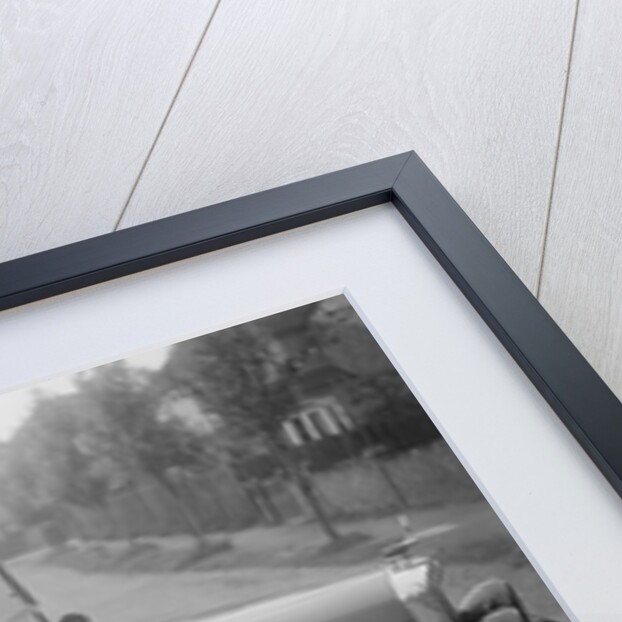 FA Thatcher behind the wheel of a 1929 Triumph Super Seven open four-seater by Bill Brunell