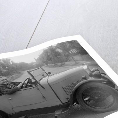 FA Thatcher behind the wheel of a 1929 Triumph Super Seven open four-seater by Bill Brunell