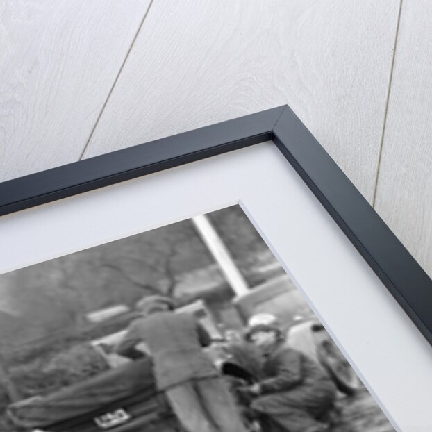 Attaching snow chains to JE Lancaster's Riley Brooklands during the Inter-Varsity Trial, 1930 by Bill Brunell