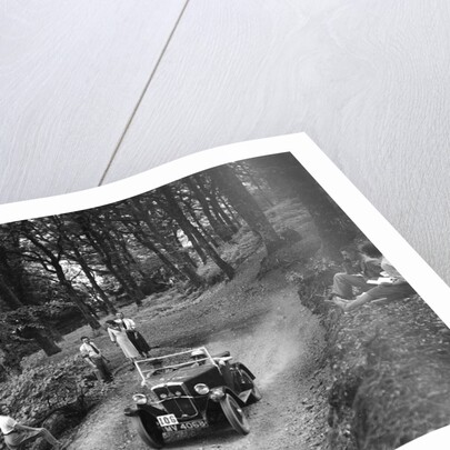 Morris Minor taking part in the B&HMC Brighton-Beer Trial, Fingle Bridge Hill, Devon, 1934 by Bill Brunell
