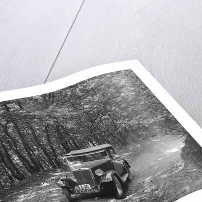 Morris Minor competing in the B&HMC Brighton-Beer Trial, Fingle Bridge Hill, Devon, 1934 by Bill Brunell