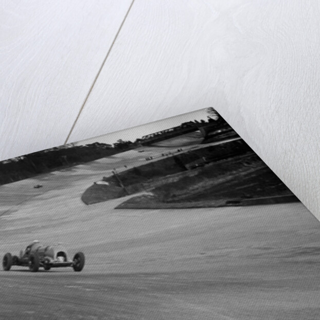 Bentley of Tim Birkin on the way to winning a race at a BARC meeting, Brooklands, 1930 by Bill Brunell