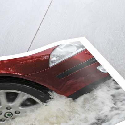 Car driving through flood by Unknown