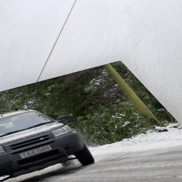 2001 Land Rover Freelander driving on icy road by Unknown