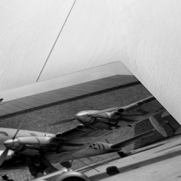 1938 Lagonda V12 4.5 litre drophead coupe with D.H. Albatross aeroplane by Unknown