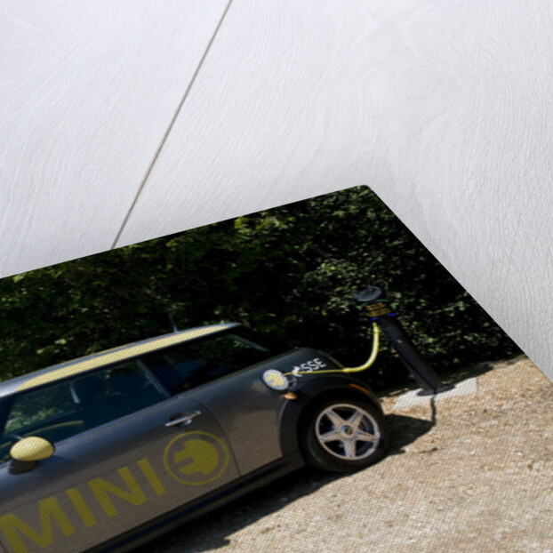Electric Mini at battery charging point 2011 by Unknown