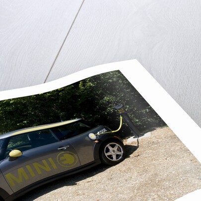 Electric Mini at battery charging point 2011 by Unknown