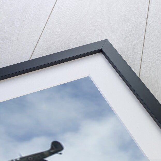 2011 Goodwood Revival Meeting, Lancaster bomber and 2 Spitfires in aerial display by Unknown