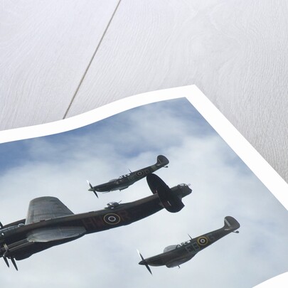 2011 Goodwood Revival Meeting, Lancaster bomber and 2 Spitfires in aerial display by Unknown